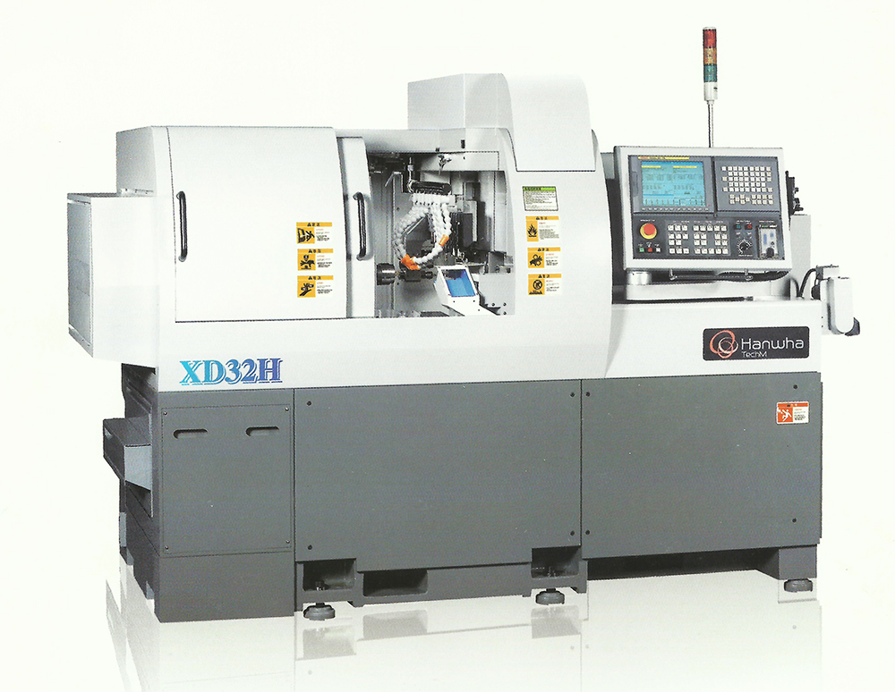 N. 1 Tornio CNC HANWHA mod. XD38N passaggio barra Ø38 (5 assi, n. 18 utensili di cui n. 6 motorizzati con asse C su mandrino e contro mandrino)